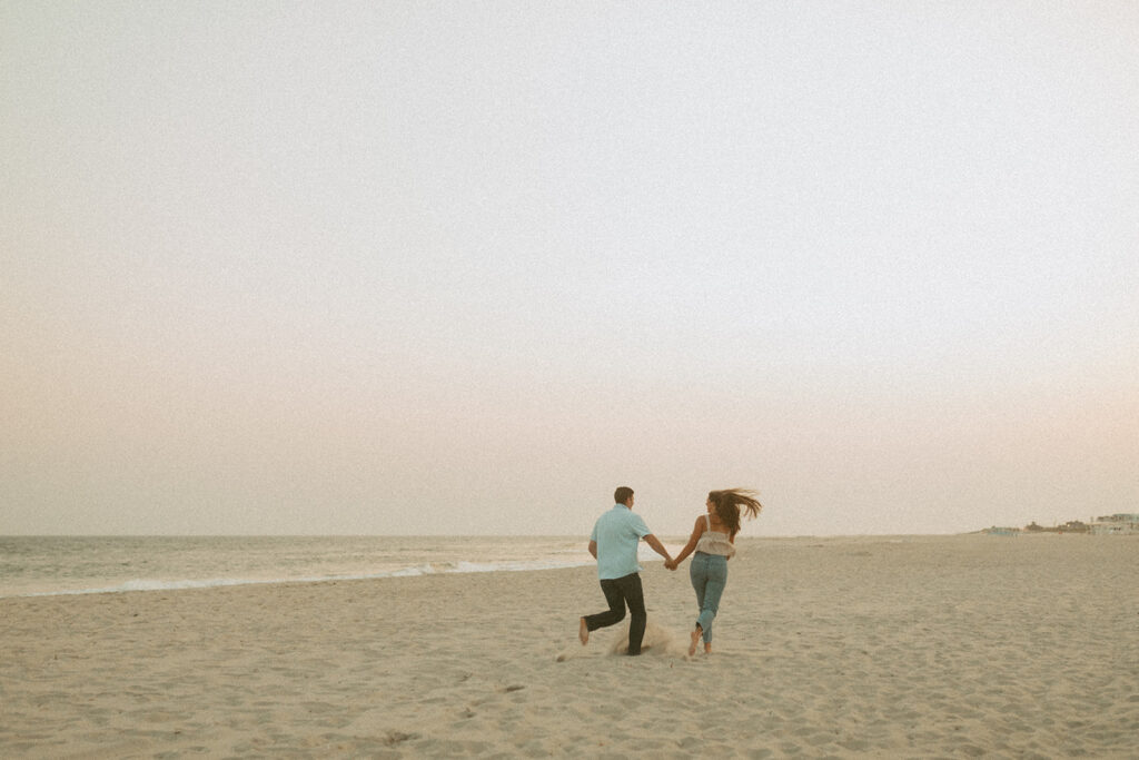 Cape May New Jersey beach engagement photos couple in the sand