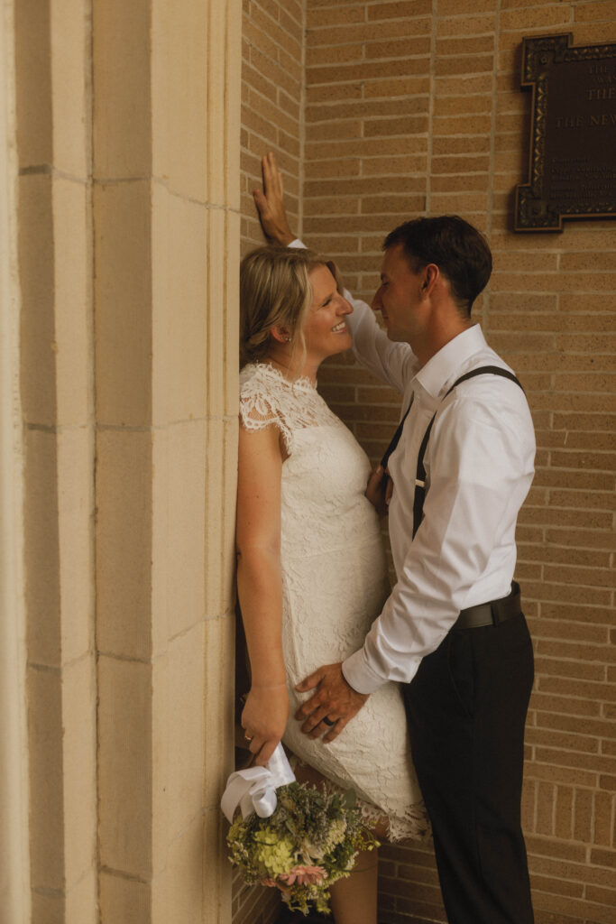 new jersey bride and groom posing at the courthouse